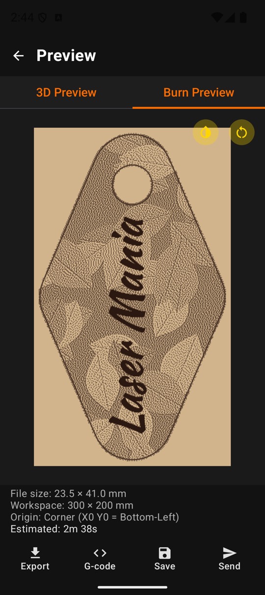 Burn preview of a laser engraved key chain with a leaf pattern and text, with size, workspace and estimated time